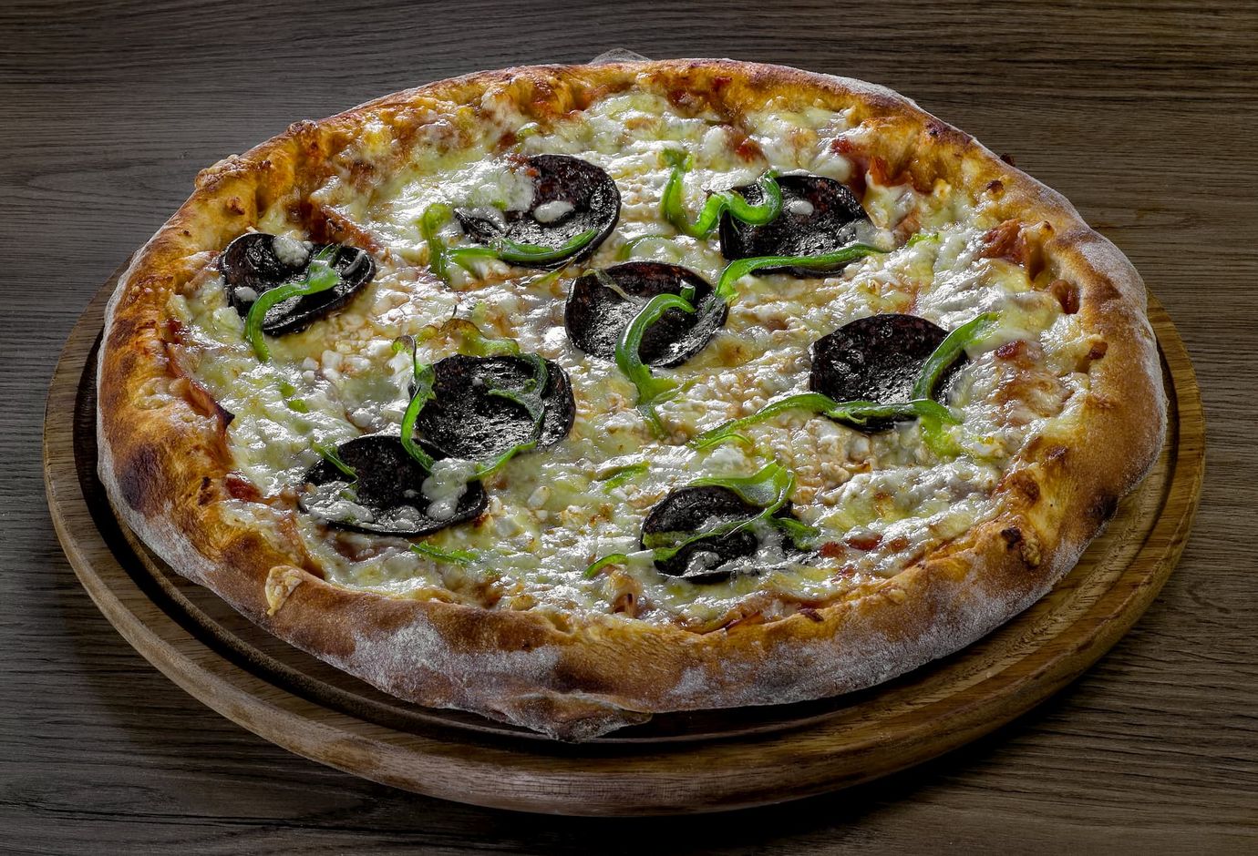 A whole Super pizza with many toppings