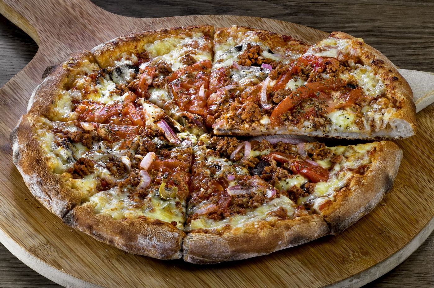 A Vesuvio pizza with peppers and sausage