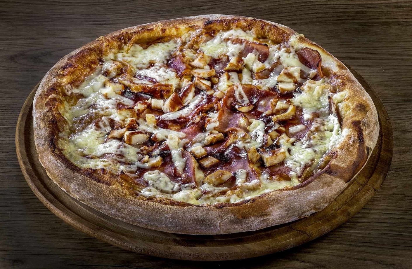 An offer with two pizzas and a soft drink